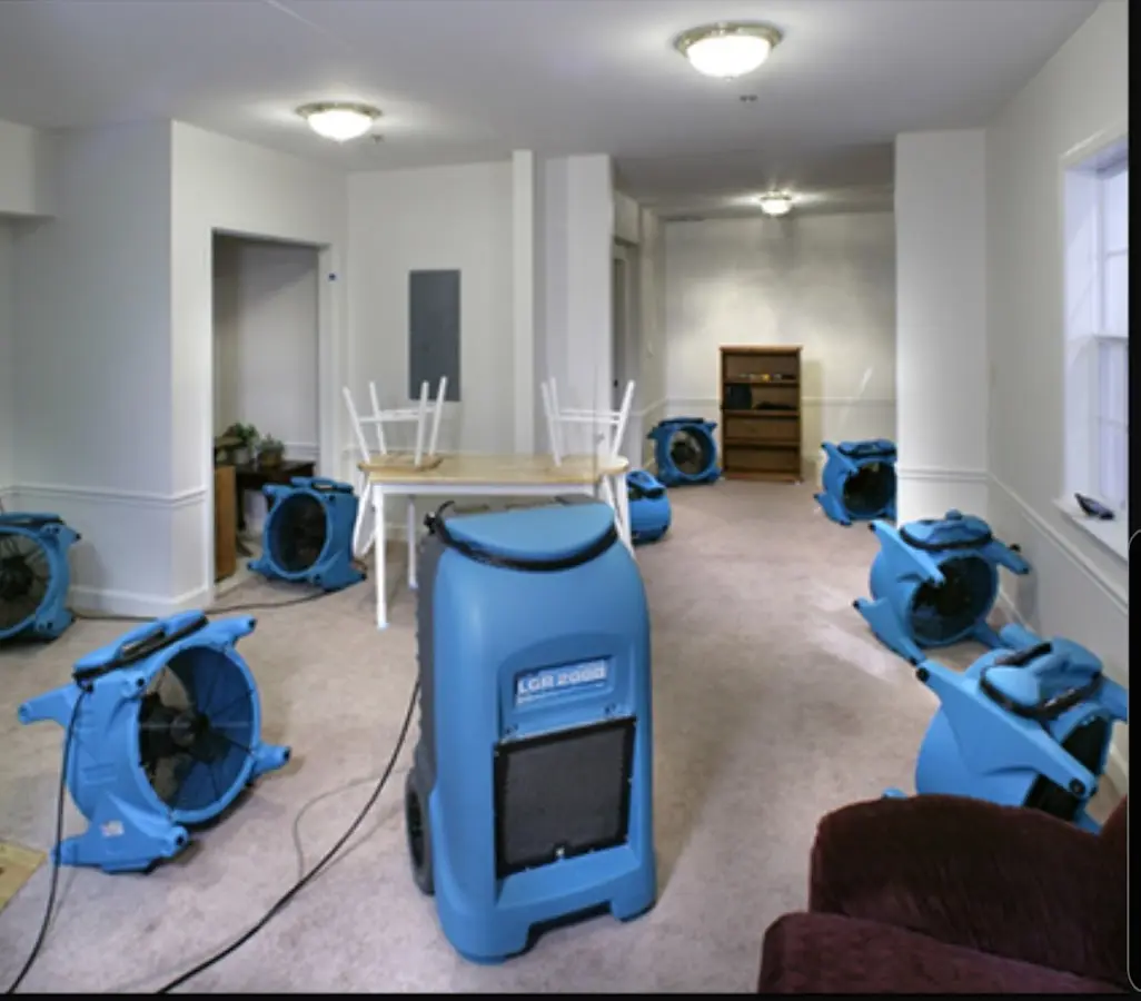 Air movers and dehumidifier setup for Water Damage Restoration in Ken Caryl